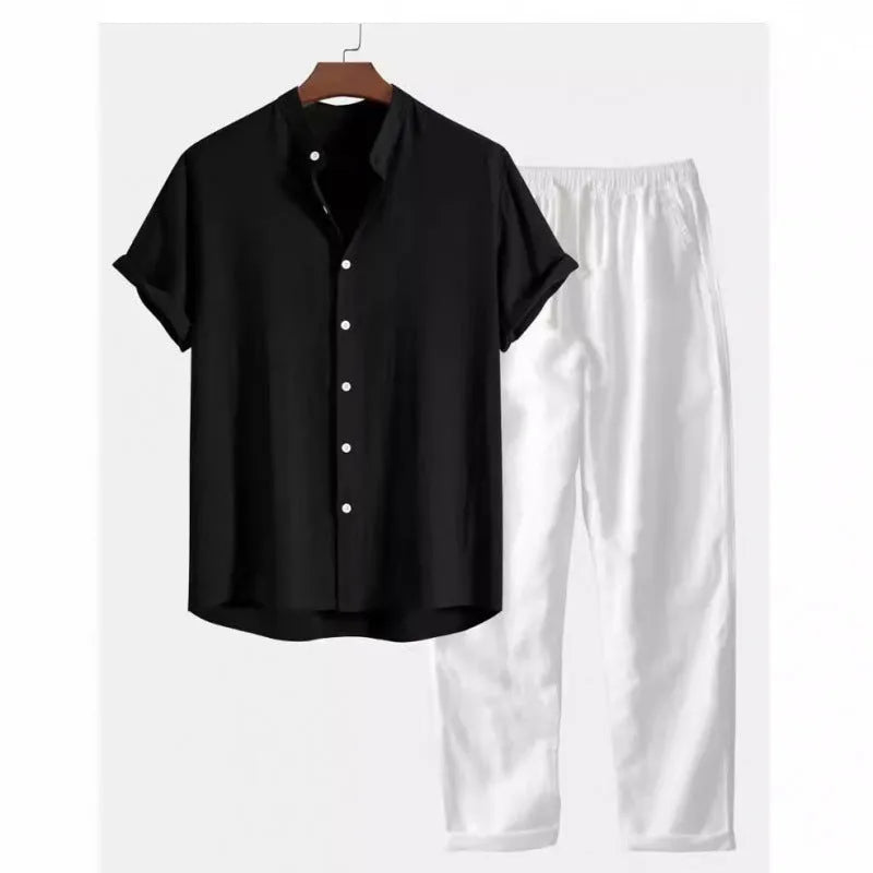 Man wearing grey blue loose short sleeve shirt and matching trousers from casual suit set
