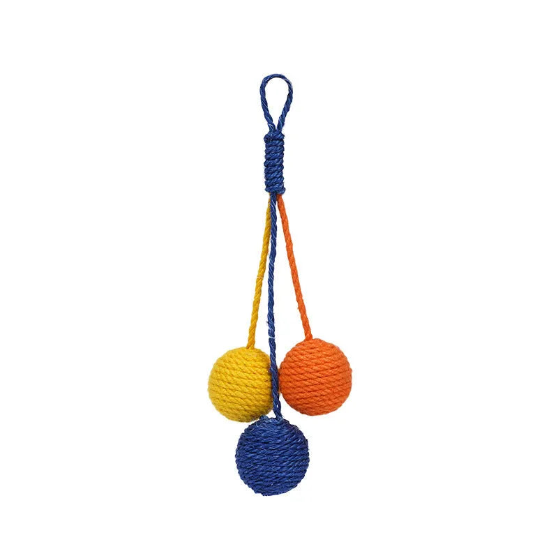 Cat toy set with blue teaser stick and multicoloured catnip ball on white background