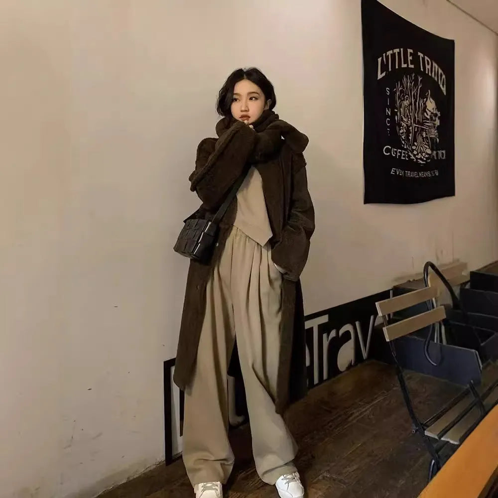 Women's khaki brown loose fit casual sports suit set with long sleeves and trousers.