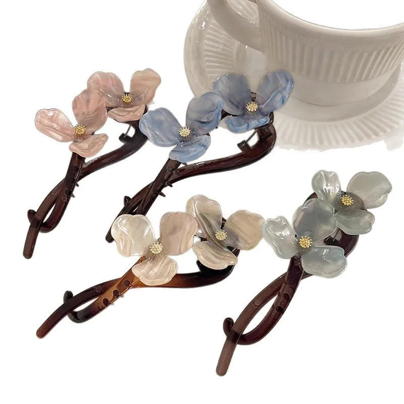 Retro flower design bobby pin hair clip with colourful acrylic petals.