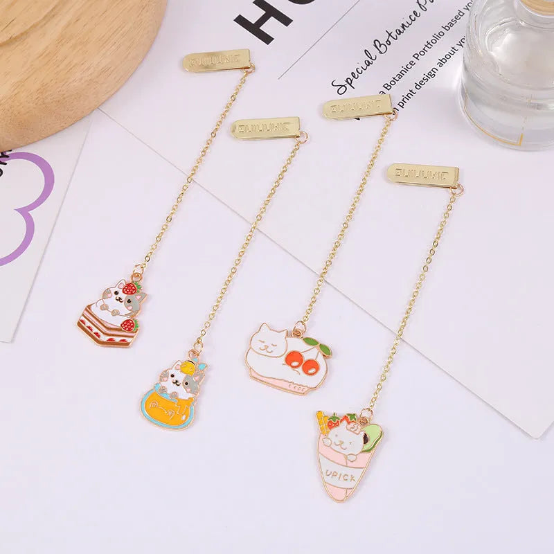 Jane Key Foodie Cat metal bookmark with cartoon cat design on laminated card.