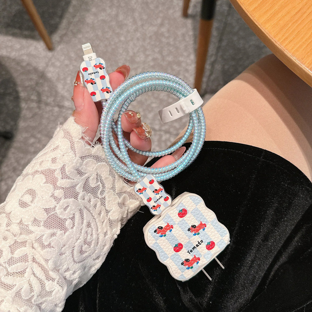 Lambskin USB cable protection sleeve in cartoon puppy designs including checkered, polka dot, and striped patterns