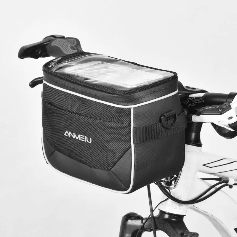 Black folding polyester bicycle bag with 7 inch capacity mounted on handlebars.