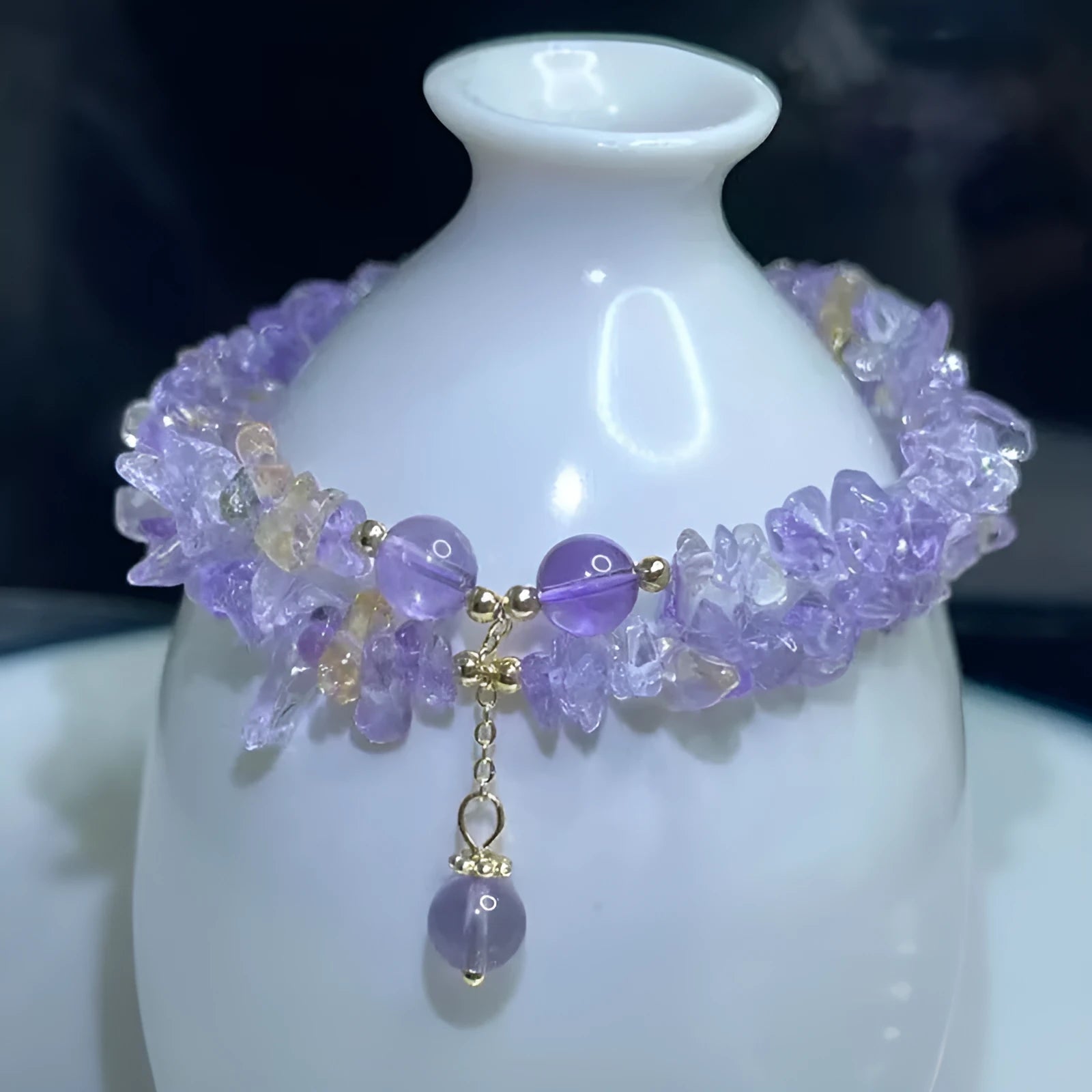 Close-up of a double-row natural ametrine gravel bracelet in D178 colour on a wrist.
