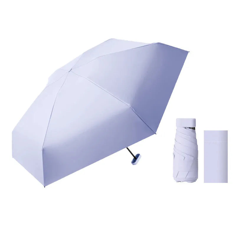 Ultra-light six-fold manual umbrella in sky blue with capsule box