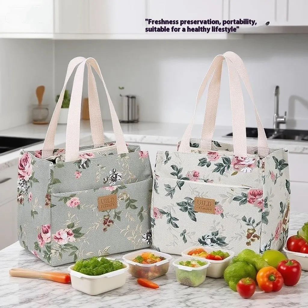 Women's large printed canvas handbag with aluminium base in floral and animal print designs.