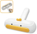 White portable pet hair remover with yellow duck design and polyester bristles.