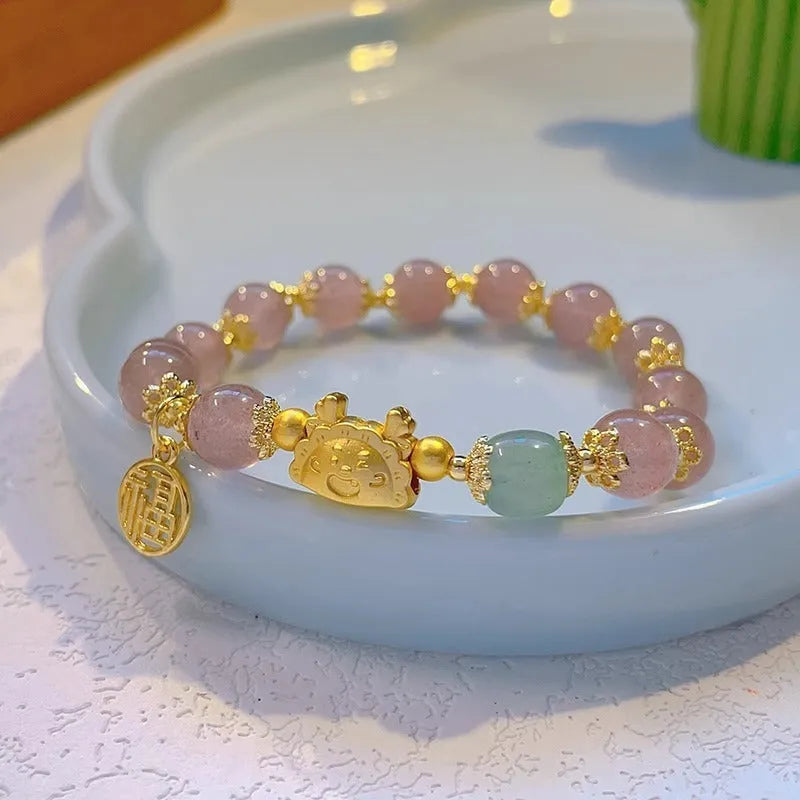 Women's floral glazed glass bracelet with electroplated finish and animal zodiac charms in classic style