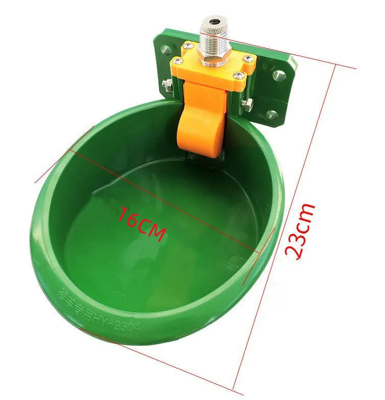 Green plastic drinking bowl for sheep with specialised nozzle design