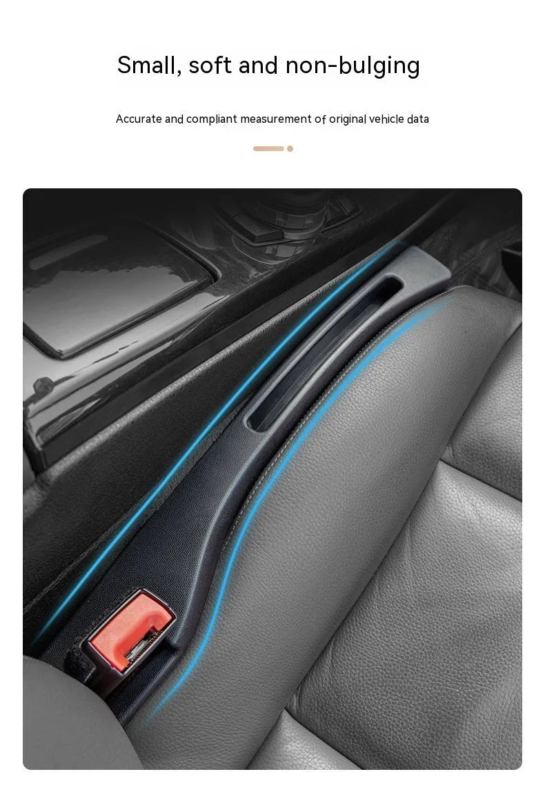 Black car seat gap storage box organiser with handle placed between vehicle seats