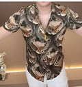 Men's printed button-up shirt on a model, available in sizes S, M, L, XL, and 2XL.
