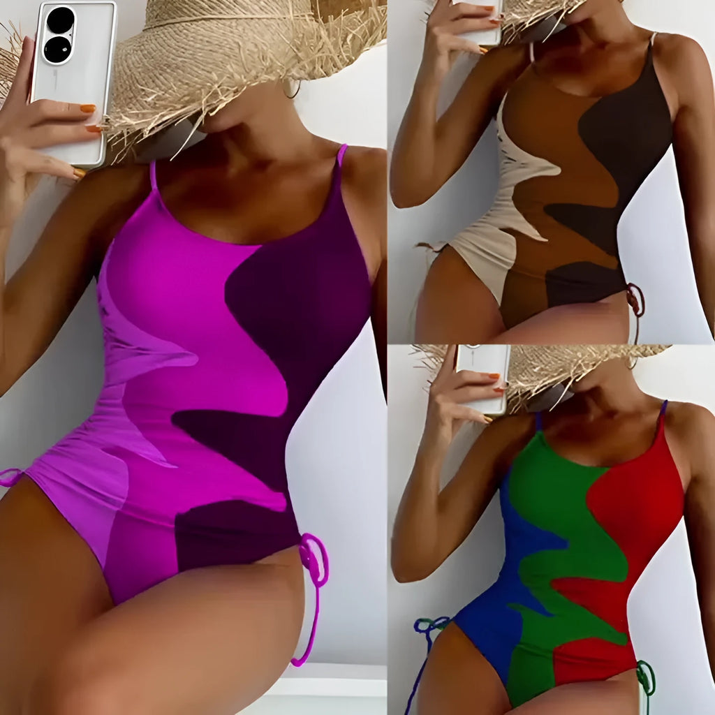 Women's sleeveless one-piece swimsuit in blue, shown from the front, with a backless design and striped pattern.