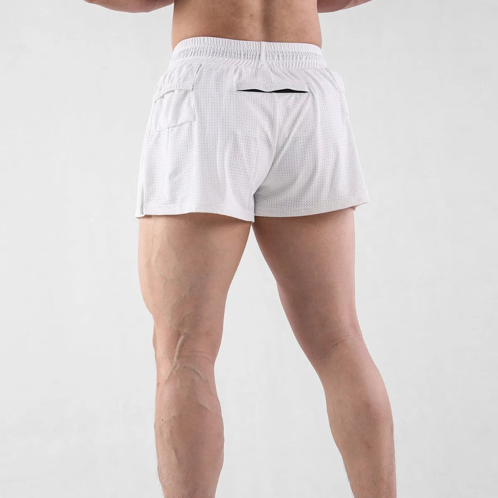 Men's black quick-drying nylon sports shorts on a summer background
