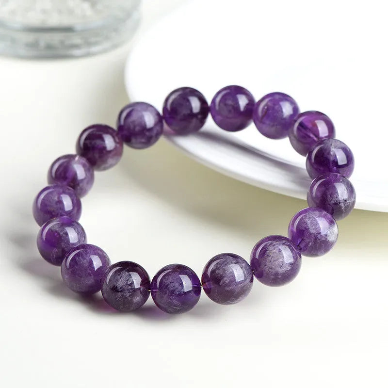 Natural feather amethyst bracelet in Snow Mountain Purple with scattered beads and Ruyi symbol