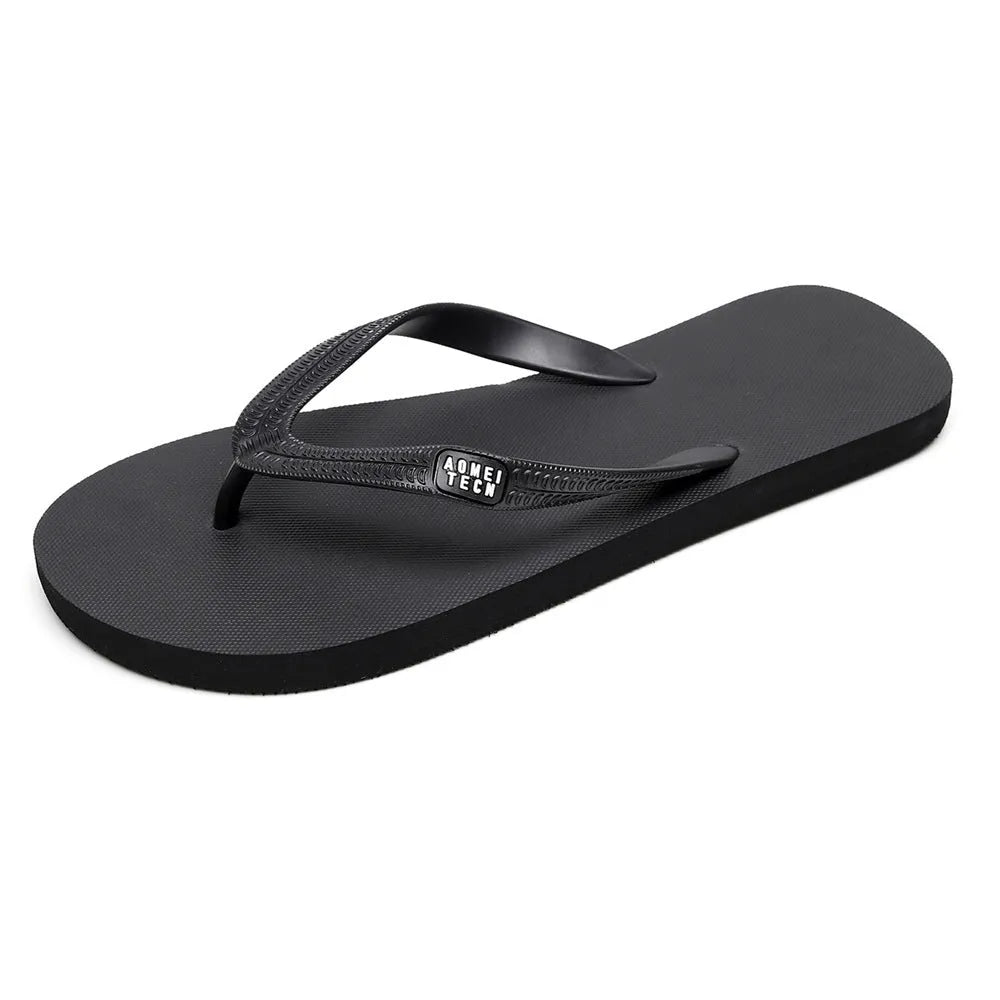 Men's black flip-flop slippers with EVA upper and rubber sole on a plain background.