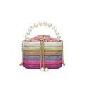 Women's European retro style crossbody bag with pearl bead embellishments and soft PU construction in round suitcase shape