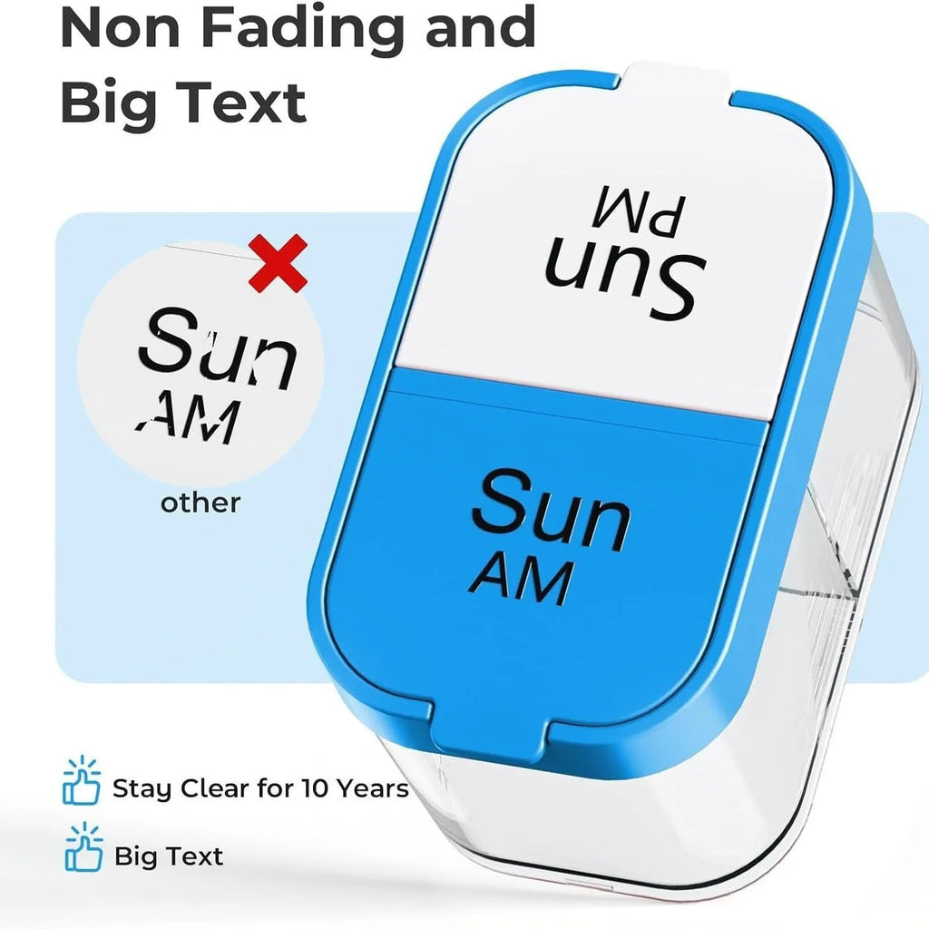 Extra large white and rainbow plastic pill organiser box with 14 removable grid compartments open on a table.