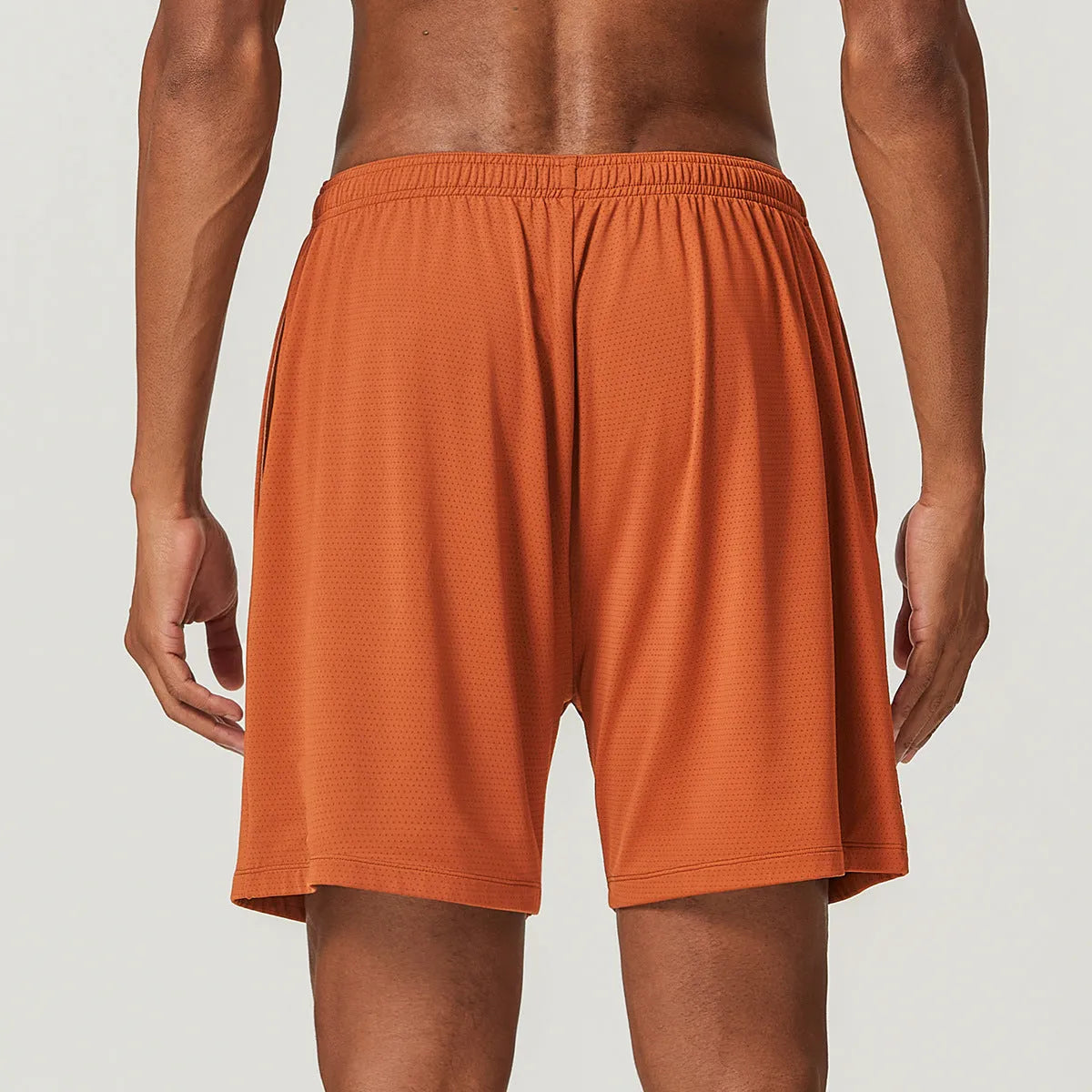 Men's sky green quick-dry running shorts with a double-layer design and mid-waist fit.