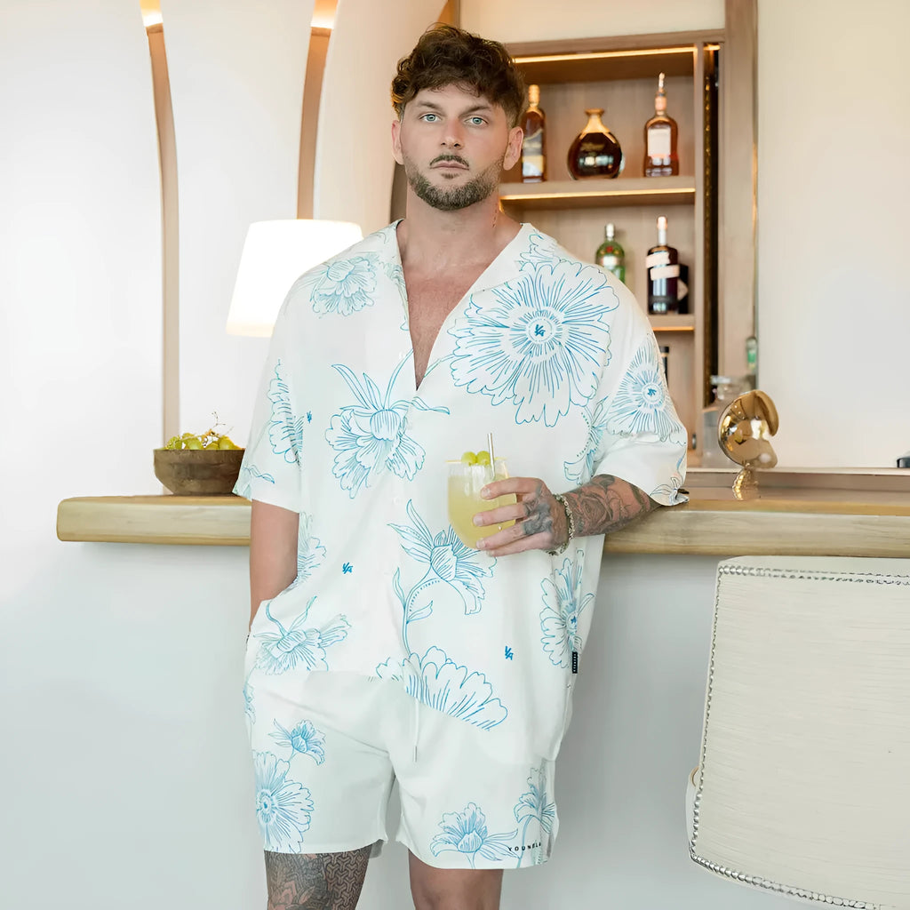 Men's loose fit short sleeve top with floral printed pattern in polyester fabric