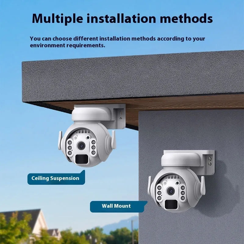 White solar-powered security camera with solar panel on top, mounted on an outdoor wall