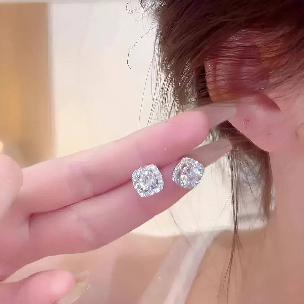 Women's square geometric alloy earrings with diamond-treatment finish in silver colour.