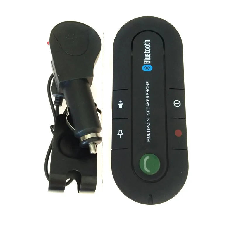 Black vehicle-mounted Bluetooth handsfree device clipped to car sun visor with car charger cable