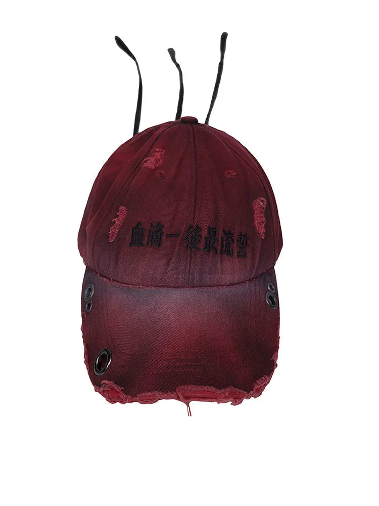 Rose red cotton peaked cap with curved brim and adjustable strap