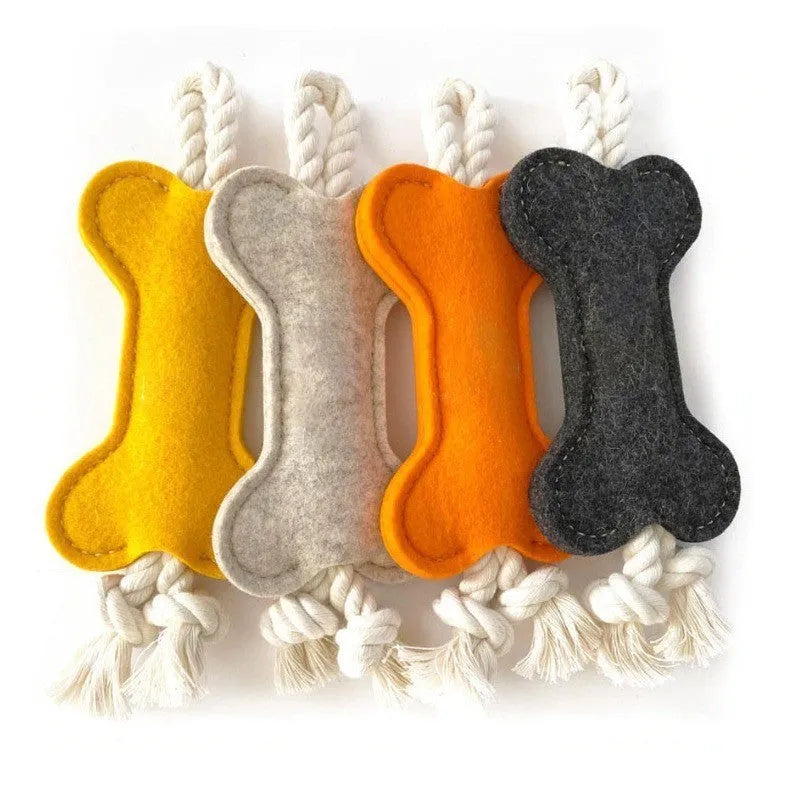 Blue bone-shaped dog chew toy made of felt fabric with visible rope knots.