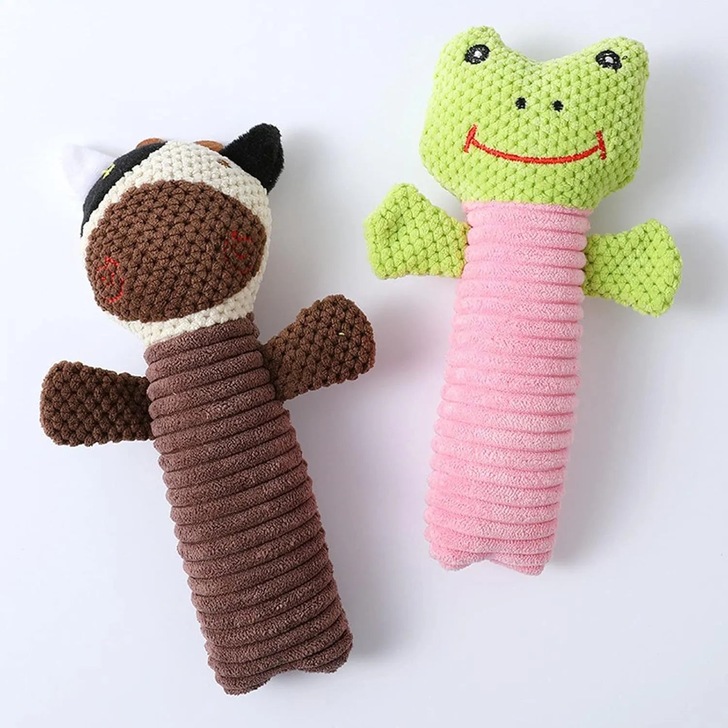 Squeaky stuffed dog chew toy in calf, frog, or puppy shape on white background