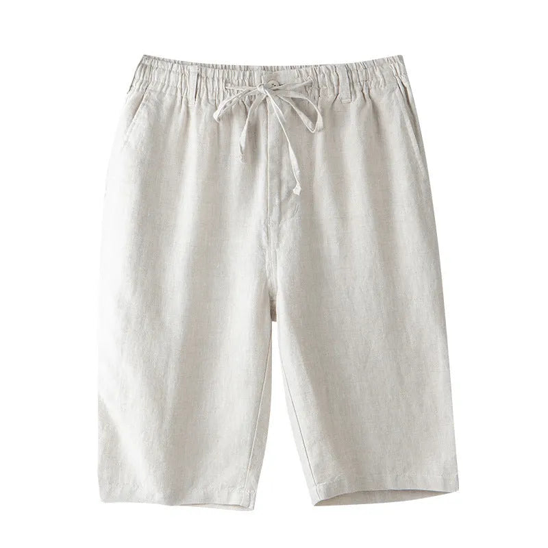 Men's loose-fit linen capri pants in a straight-leg style on a neutral background.