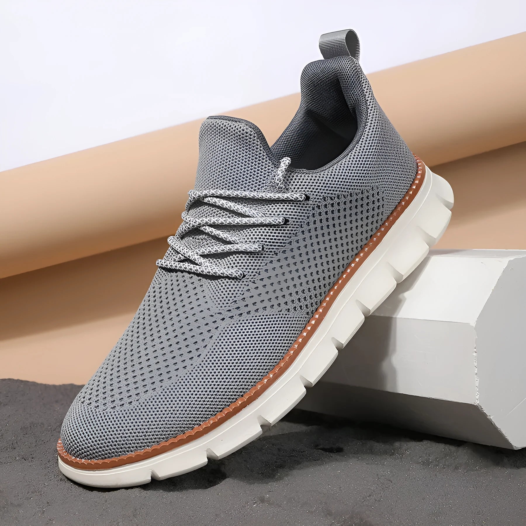 Men's grey and black casual sneakers with mesh fabric upper and round toe design