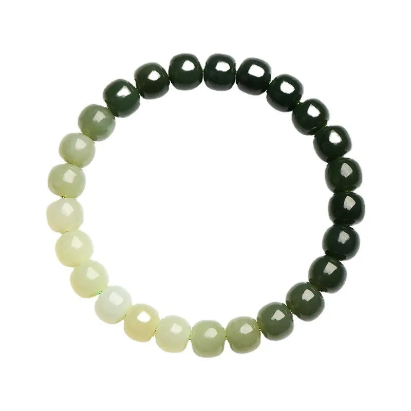 Hetian Jade bracelet with water gradient colours showing polished beads in natural stone