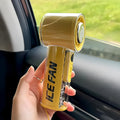 Handheld personal fan with refrigeration function in yellow, white or black colours