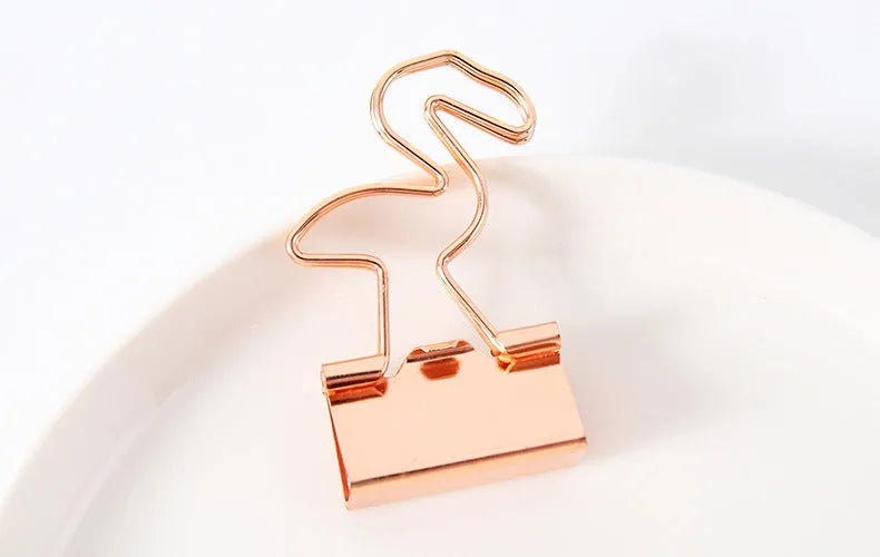 Gold-coloured metal alligator hair clip in a choice of flamingo, love, cloud, cat, cactus, or bow shapes.