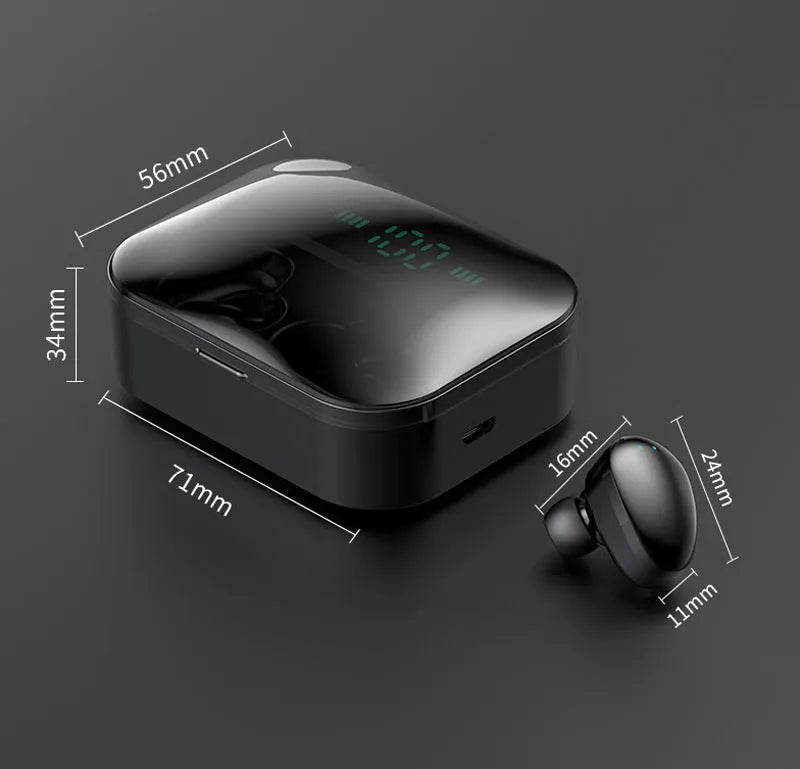X7LED black and white sports Bluetooth in-ear headphones with USB charging case on a table