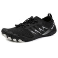 A pair of low-top river tracing shoes in a casual style with a mesh upper and rubber sole.