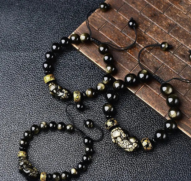 Hand-woven golden obsidian bracelet with Pi Xiu charm in 8mm, 10mm, 12mm, and 14mm bead sizes.
