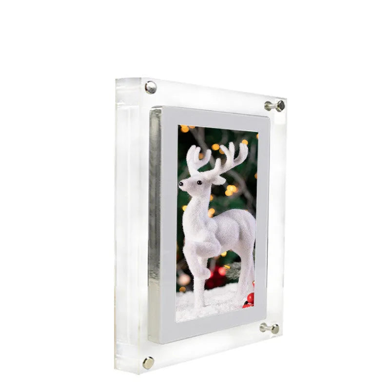 White acrylic digital picture frame showing family photos on a 5-inch vertical screen