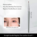 Angled bend head eyeliner makeup brush for precise under eye and tear trough application.