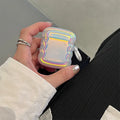 Magic laser silicone case for AirPods showing iridescent colour-changing finish on wireless earbud charging case