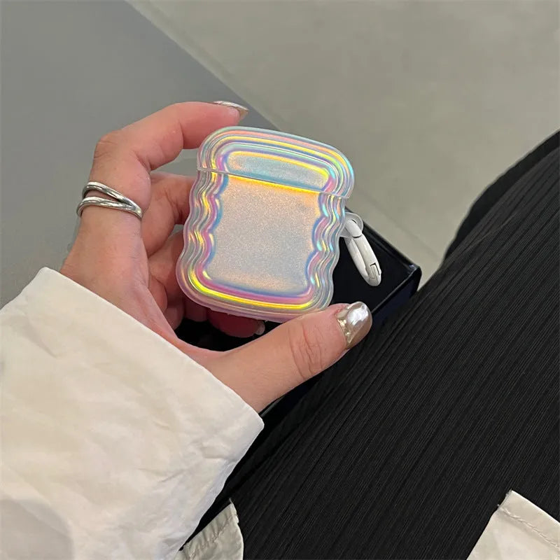 Magic laser silicone case for AirPods showing iridescent colour-changing finish on wireless earbud charging case