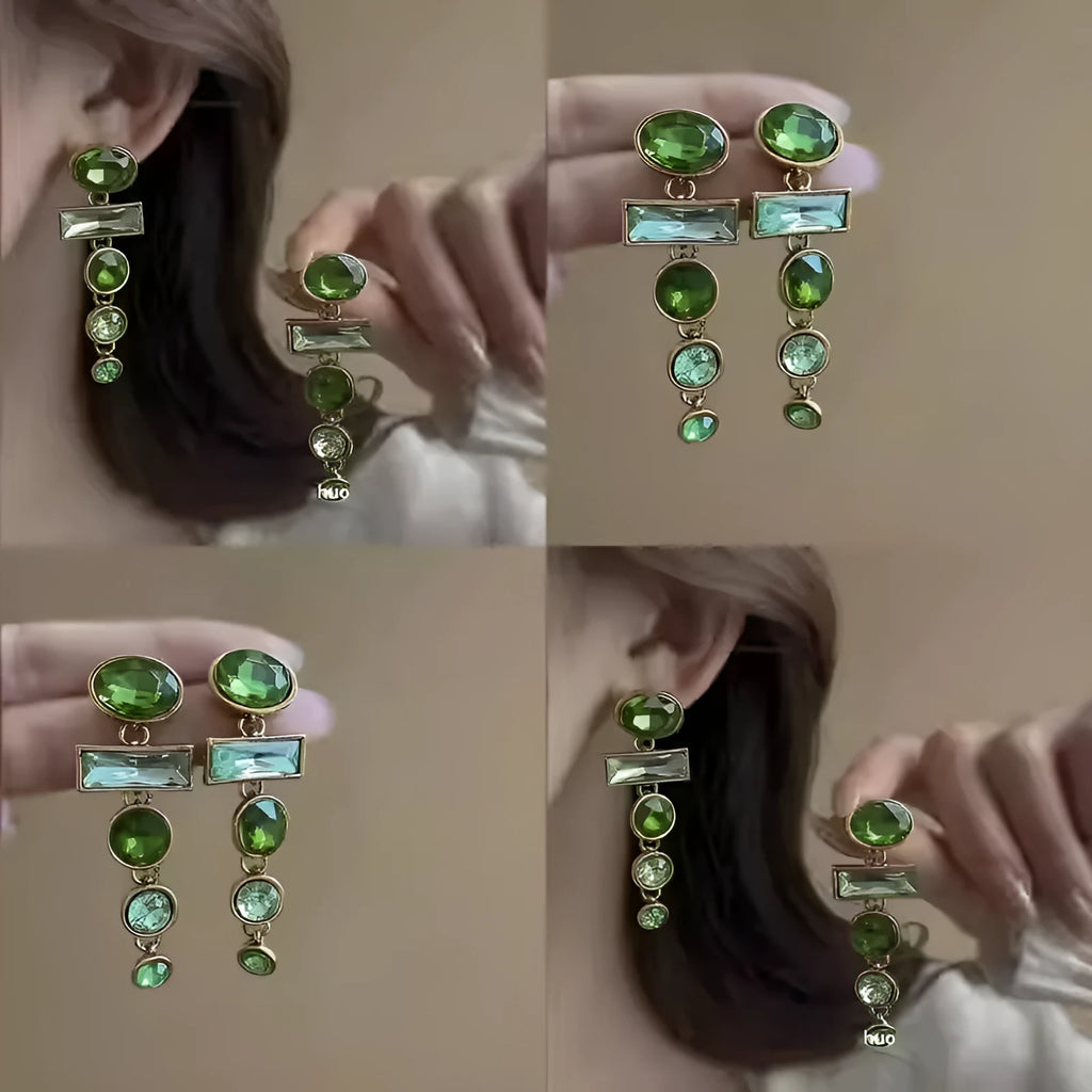 A pair of geometric green gradient alloy earrings with tassel design and inlaid zircon stones.
