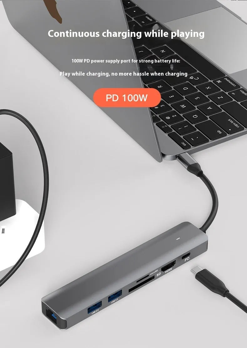 LQT-LH07 7-in-1 USB-C computer hub with card readers and charging port on a desk.