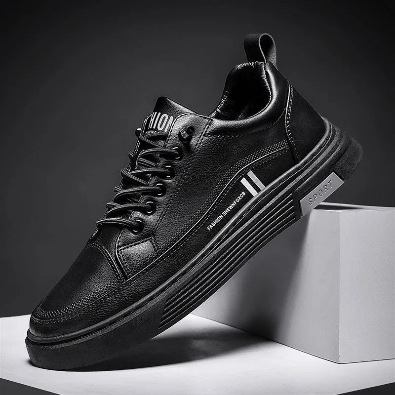 Men's low-top white skate shoes with elastic band fastening and a round toe, shown on a plain background.