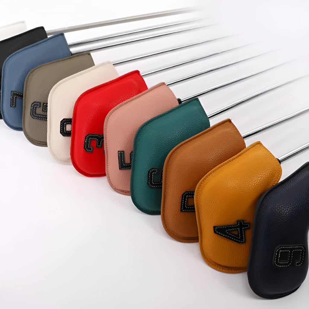 Set of 10 multi-coloured PU golf club head covers with ball head design on a golf bag.