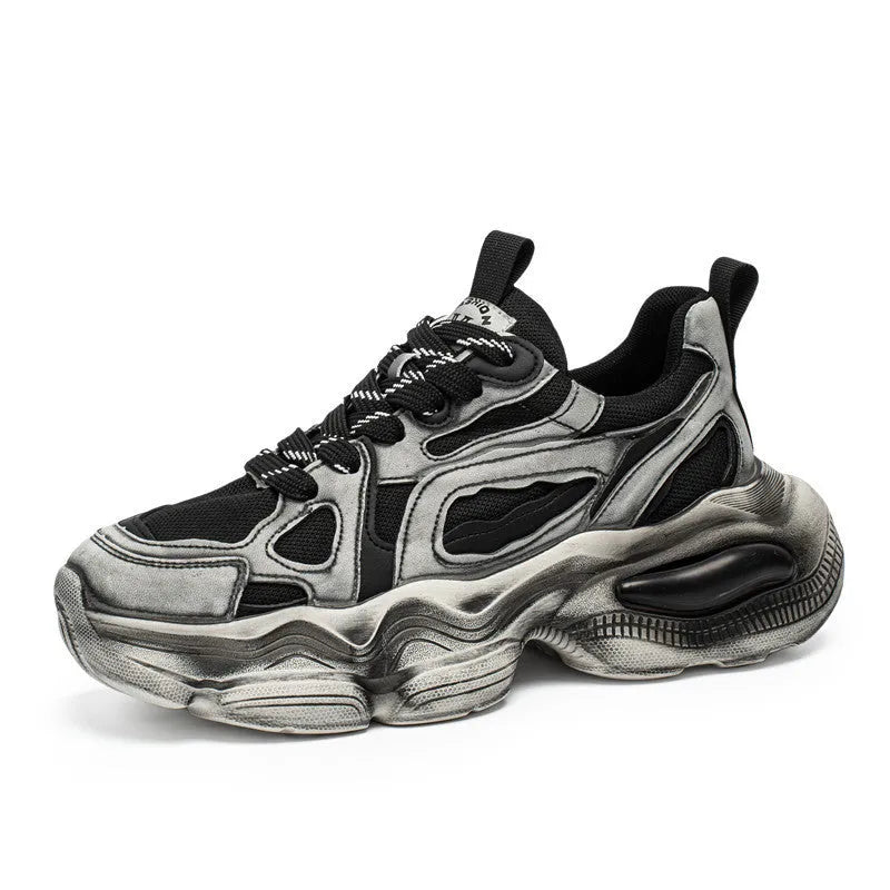 Men's black mesh sneakers with platform sole and sporty design features