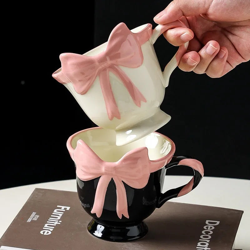 Ceramic mug with heart bow design in black pink colour, 301-400 ml capacity