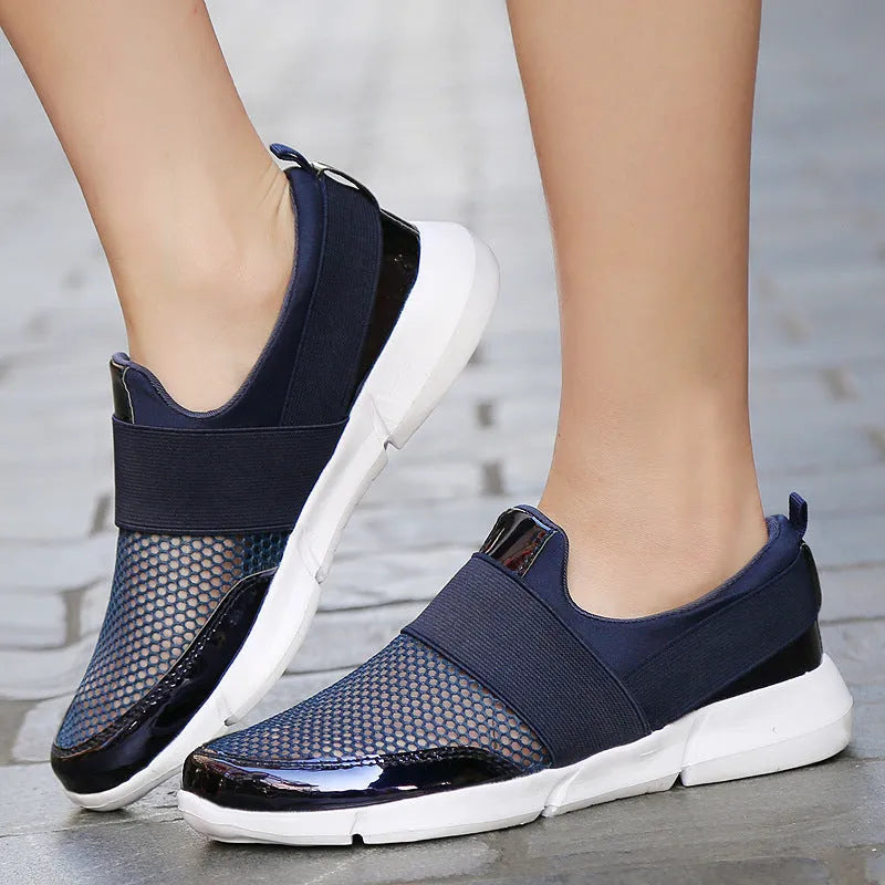 Women's low-top mesh sneakers in blue, black, or grey with casual design and PU midsole.
