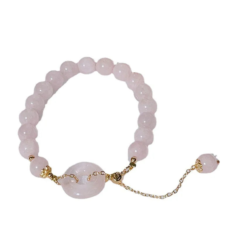 Pink crystal women's bracelet with distinctive peace buckle clasp, simple jewellery design