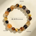 Women's natural yellow tower 10mm artificial crystal string bead bracelet on a white background.